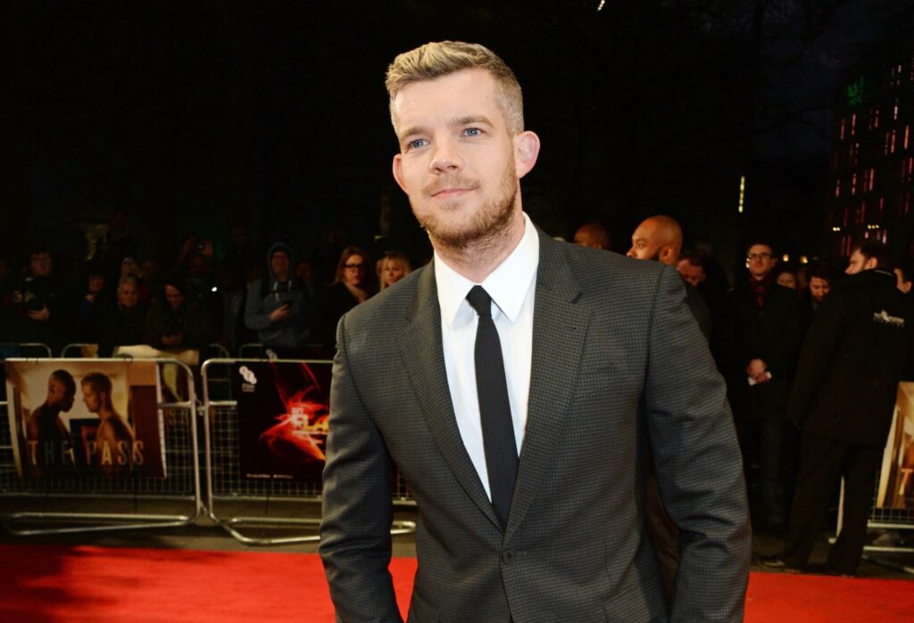 Russell Tovey in tux on the red carpet at the festival in 2016, promoting The Pass
