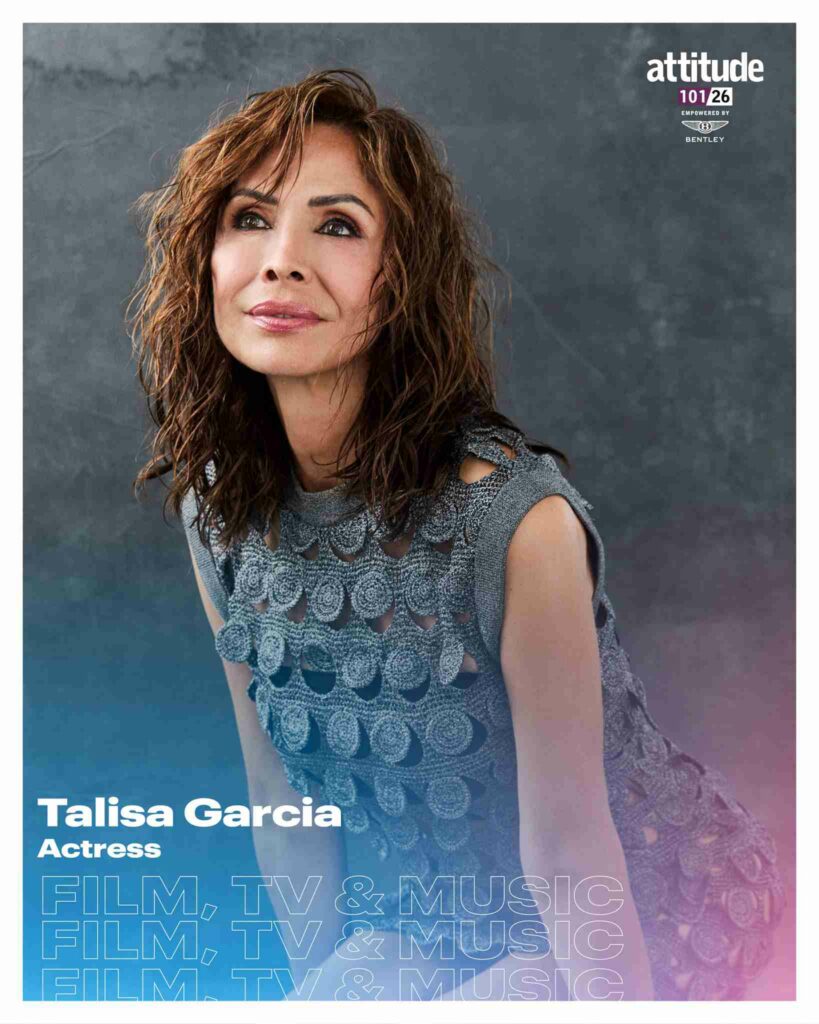 A portrait of Talisa Garcia looking upward against a softly blurred grey outdoor background, wearing a sleeveless silver beaded top with circular embellishments, with wavy dark hair. The image is overlaid with Attitude 101 2026 branding and text identifying her as an actress in the Film, TV & Music category, empowered by Bentley.
