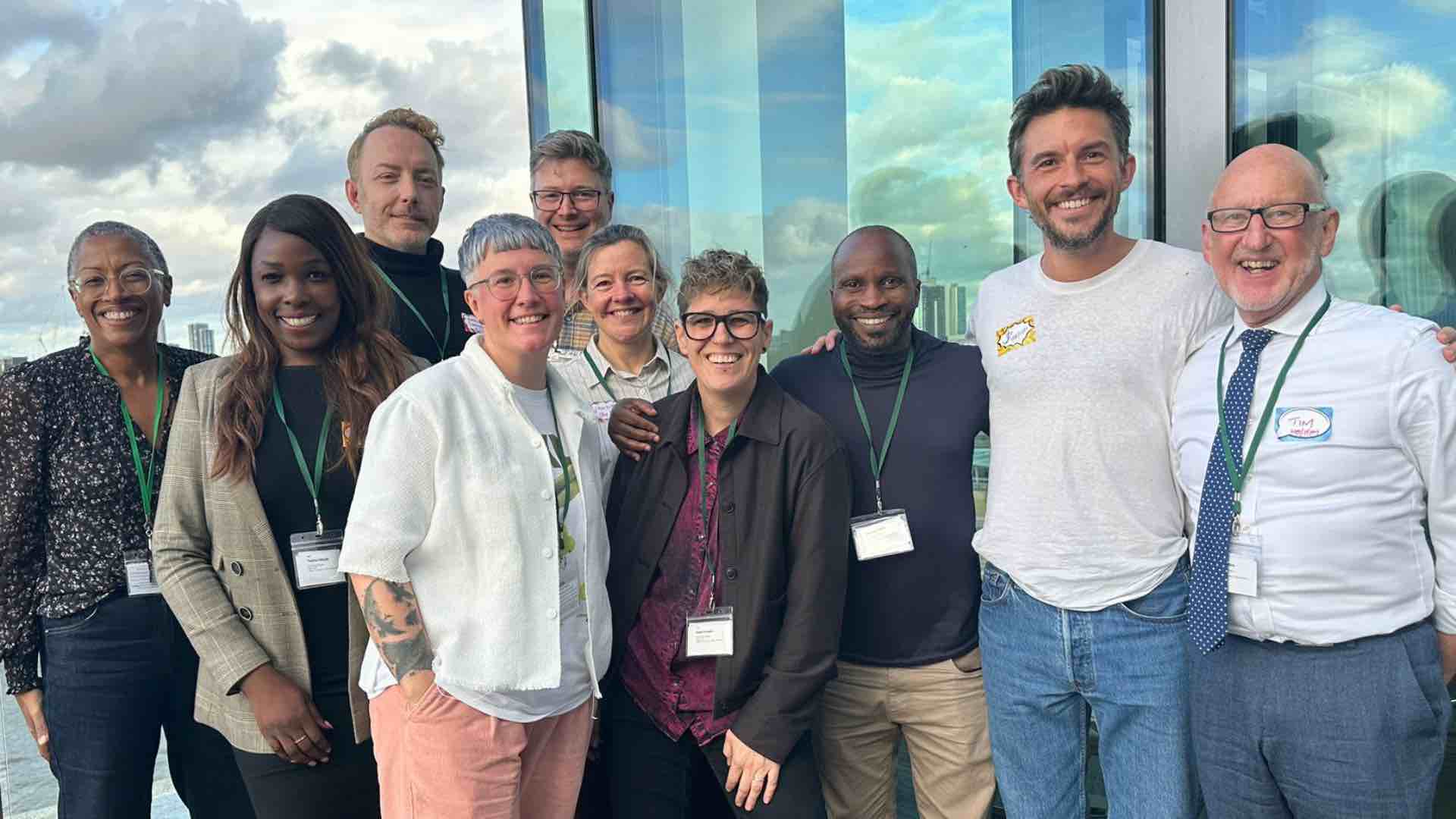 (Right)Tim Gittins Trustee at Out Together next to Jonathan Bailey, along with representatives from other charity partners of The Shameless Fund