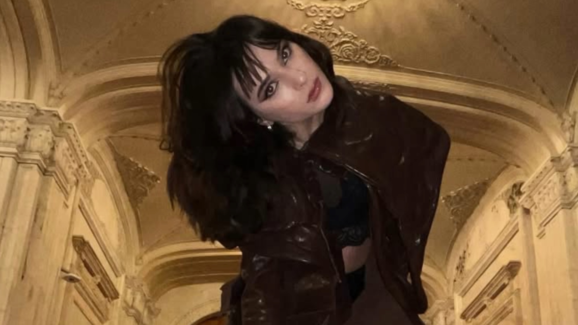 Alexandra Căpitănescu poses inside Romania's Palace of the Parliament