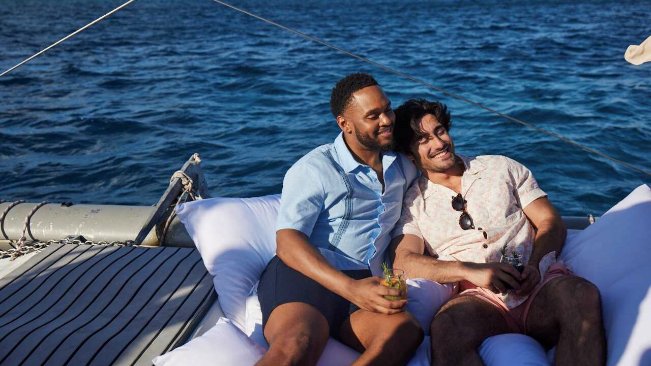 Couple Enjoying a Drink on a Boat