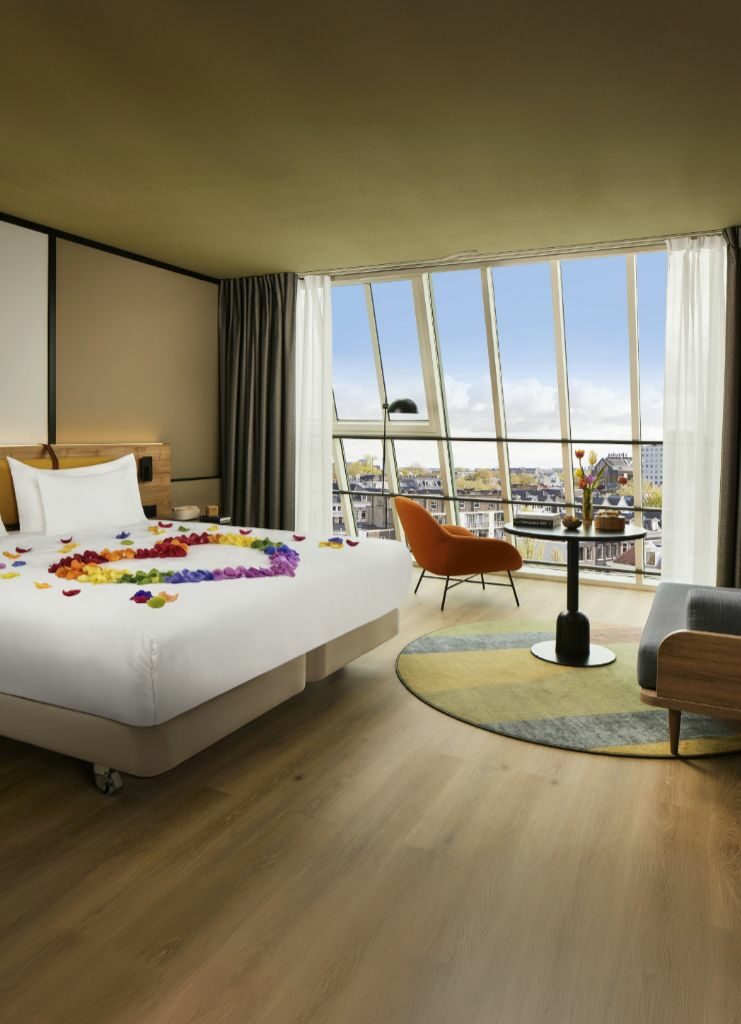 A superior double panoramic canal view room at Avani Museum Quarter Amsterdam Hotel