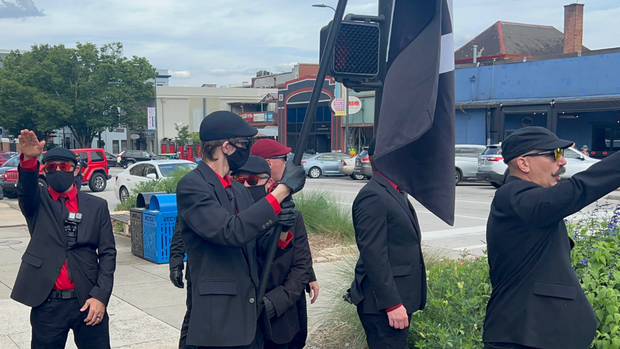 Athens PrideFest is disrupted by men carrying a swastika flag