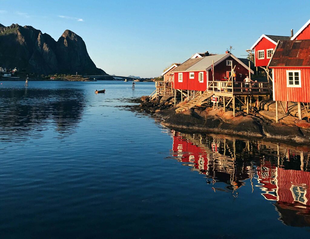 Lofoten Islands' bright red buildings next to the water