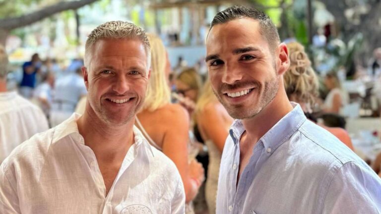 a photo from Ralf Schumacher showing him and husband Étienne Bousquet-Cassagne posing at a terraced event