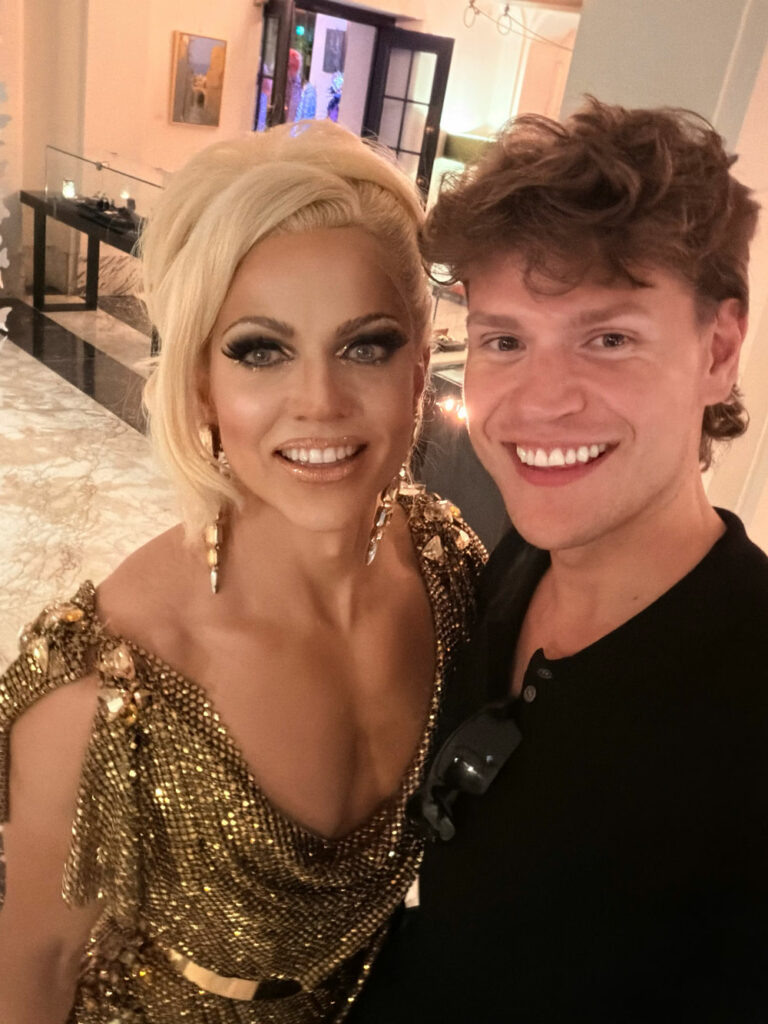 Writer Ashley Davey bumping into Courtney Act