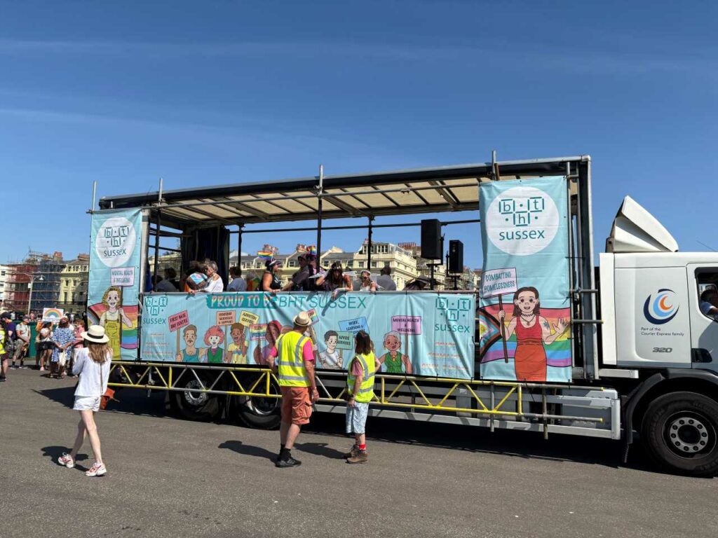 People walking in the parade at Brighton Pride