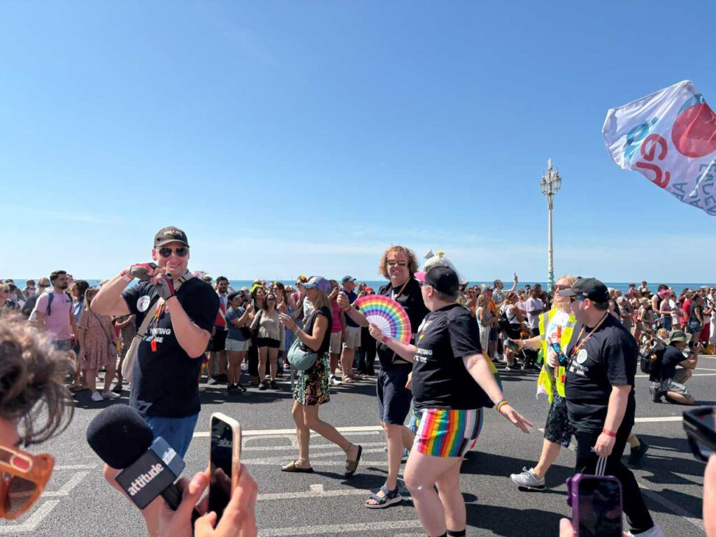 People walking in the parade at Brighton Pride