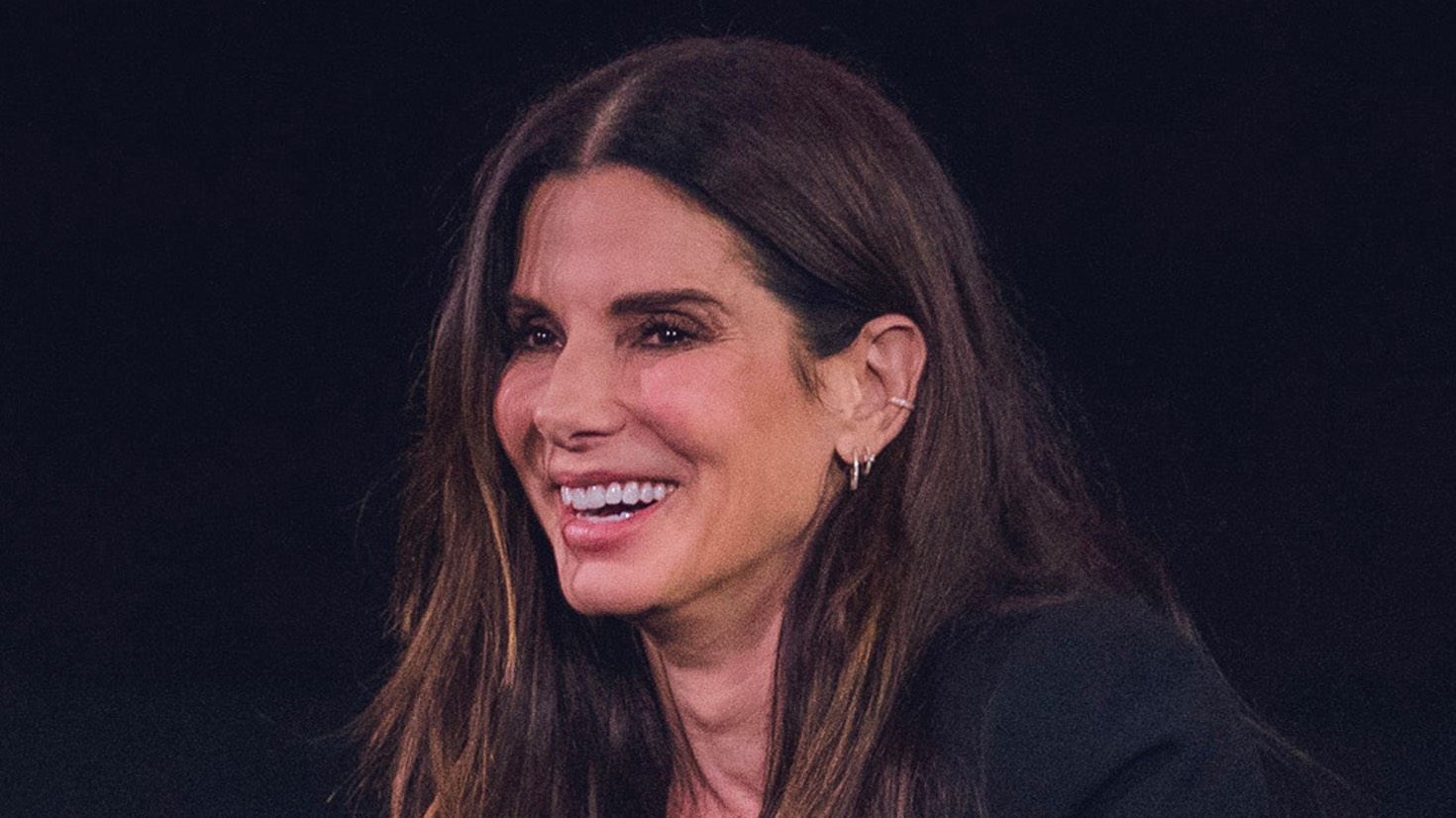 a landscape shot, close up of Sandra Bullock's face