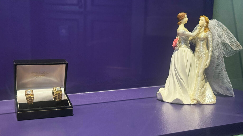 Men's wedding rings and brides cake topper at Queer Amsterdam, the Pink City