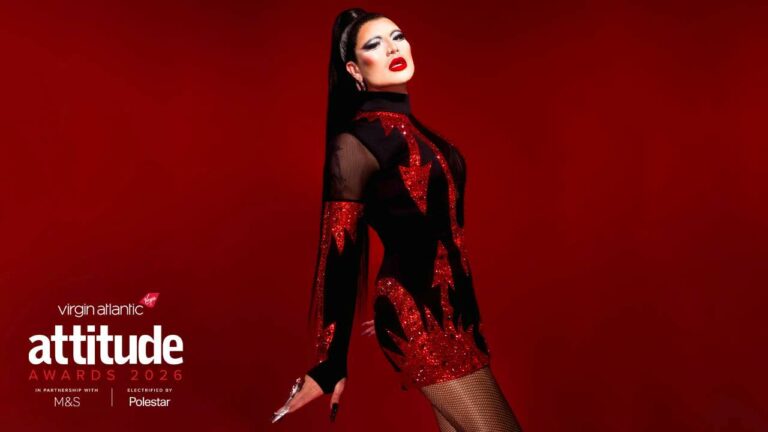 Danny Beard in a red and black dress